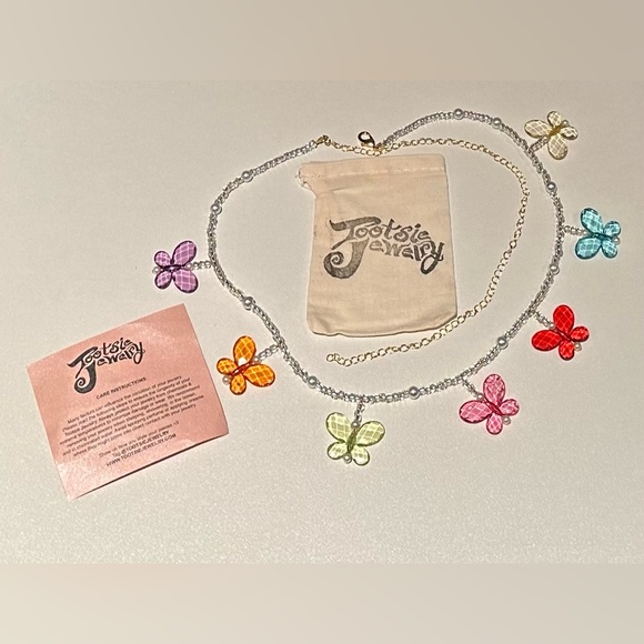 NWT TOOTSIE BUTTERFLY BELLY CHAIN

Size OS - Picture 2 of 2